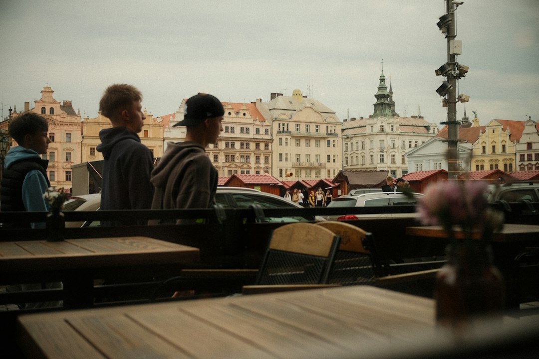 Historic European square with pedestrians and traditional architecture