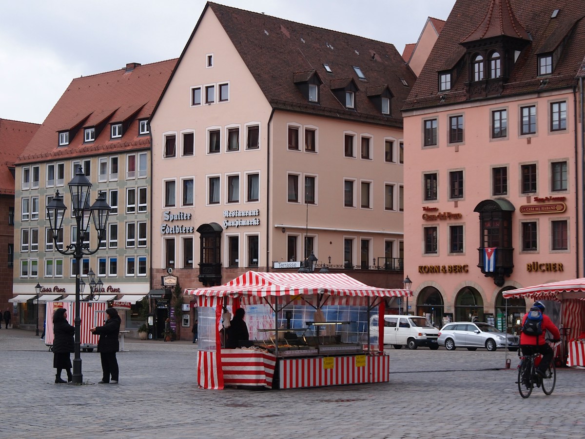 Visitors walking through a historic German town street during the festive season