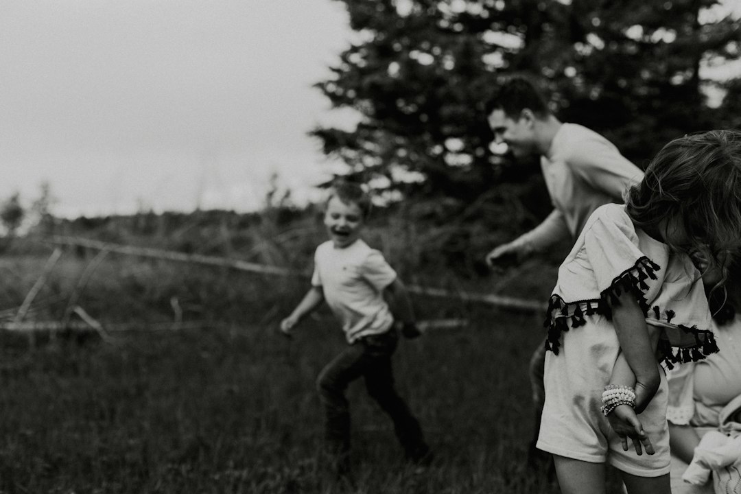 Children playing frisbee together outside