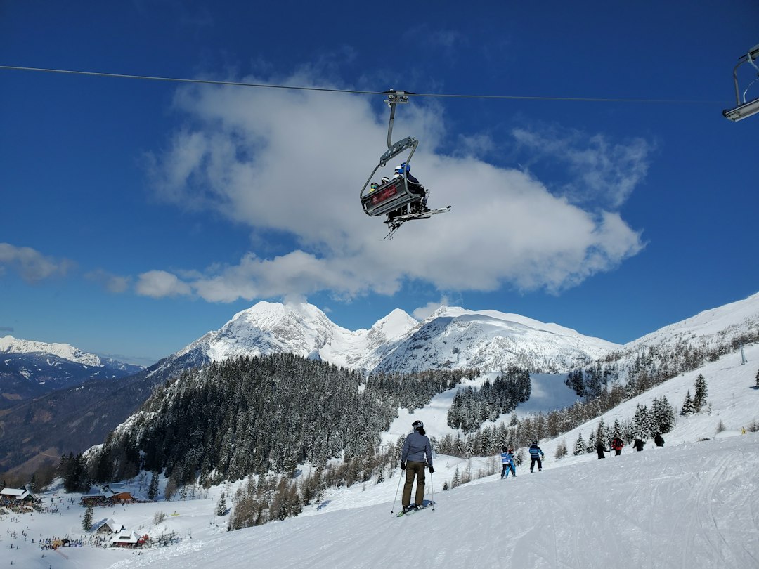 Skiers on the slopes at Krvavec ski resort in Slovenia