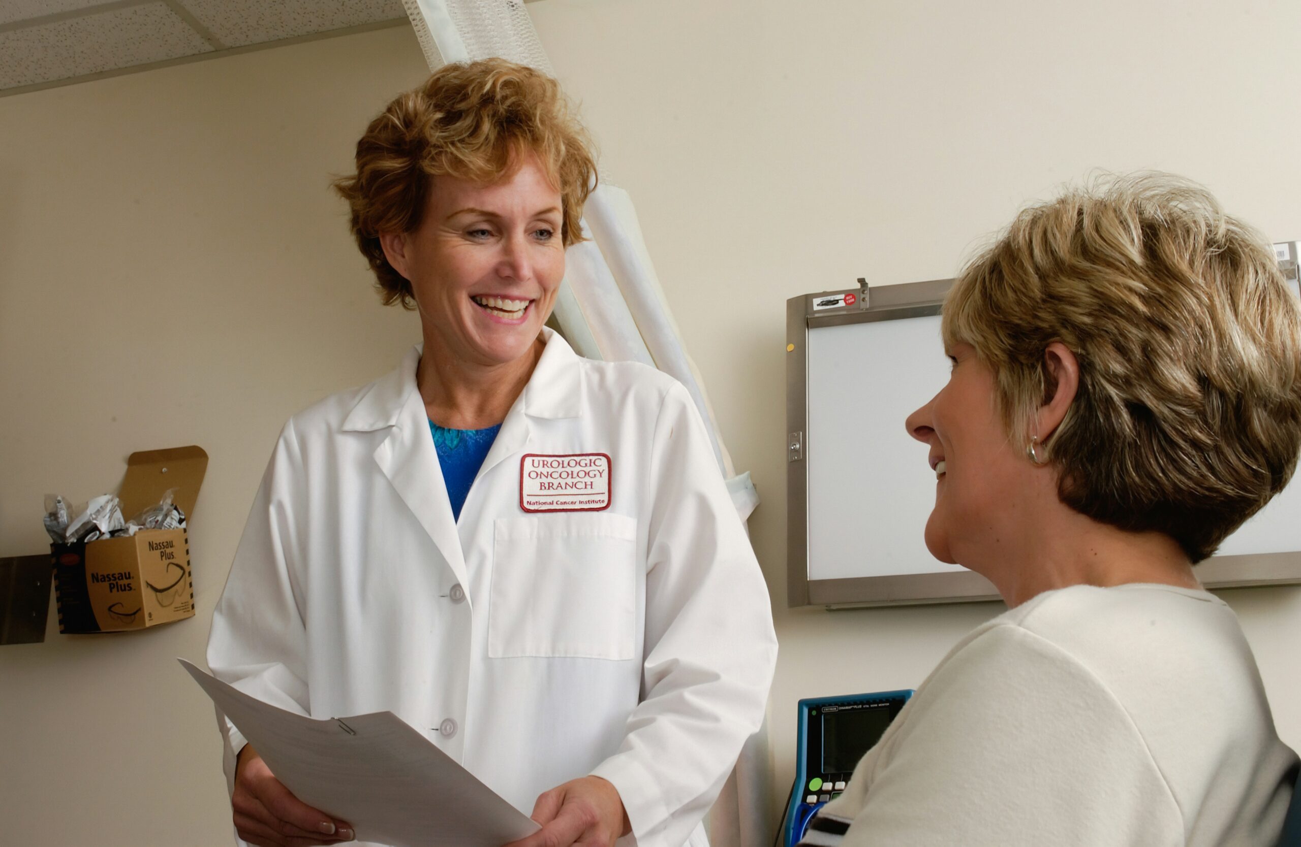 Doctor consulting with a patient, illustrating healthcare planning for families travelling in Southeast Asia