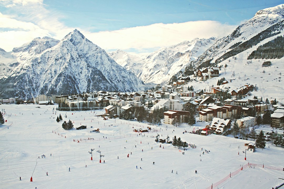 Snow-covered Alpine village and mountains near Samoëns, France