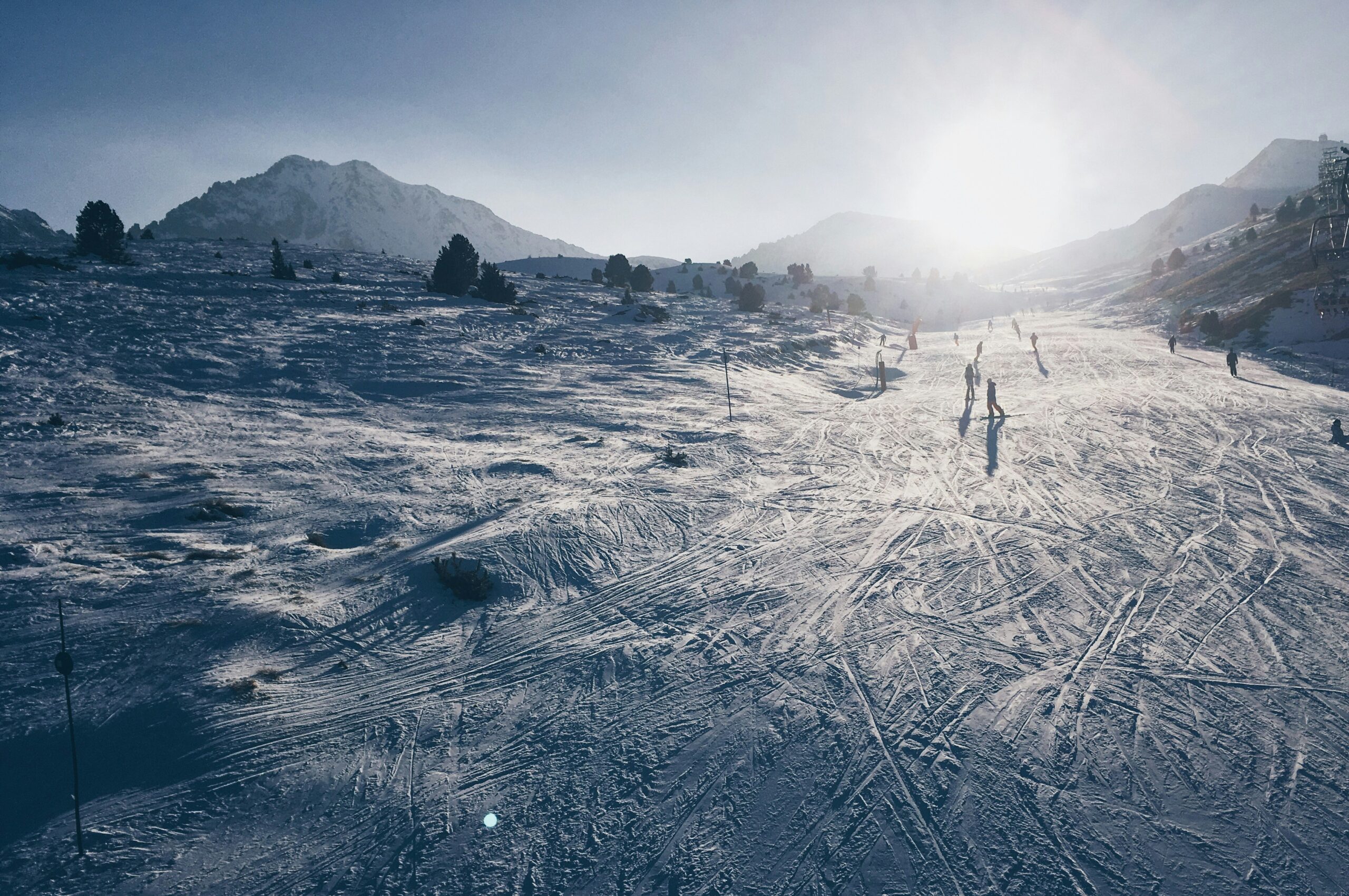 A snowboarder enjoying the snowy slopes in Andorra
