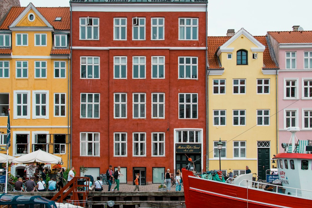 Colorful waterfront buildings in Copenhagen, a popular European city for family walks