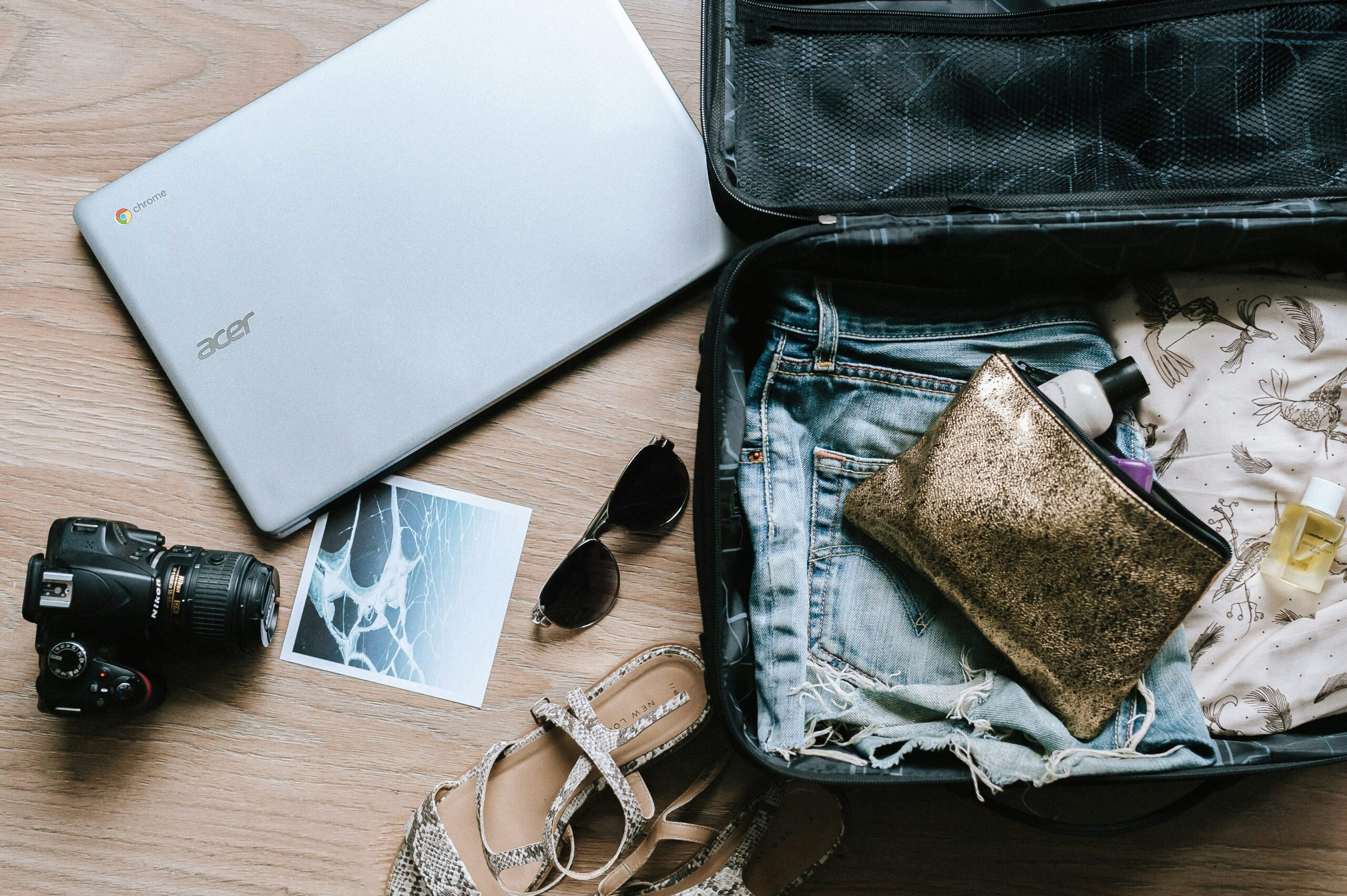 Travel essentials laid out for packing