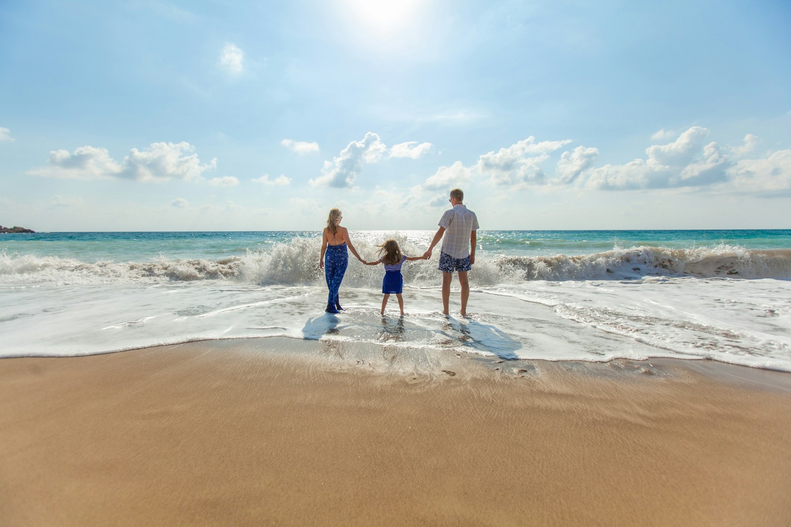 Family enjoying a beach holiday together